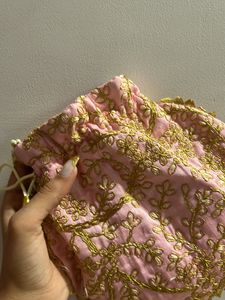 handmade Pink potli with gold embroidery