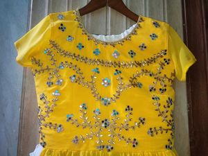 elegant white mirror work lehnga and yellow mirro