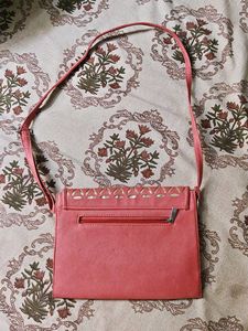 Stylish Pink Crossbody Bag with Cutout Detail