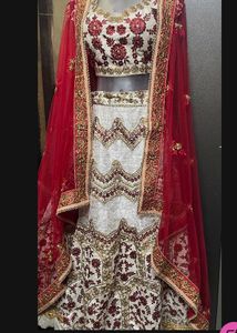 Exquisite off white & Red Lehenga Choli