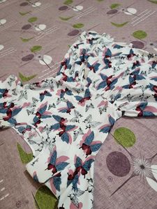 (PRICE DROP )Butterfly Peplum Top
