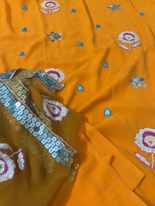 Vibrant orange unstitched suit  Embroidered Saree