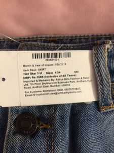 Forever 21 Ripped Denim Mini Skirt
