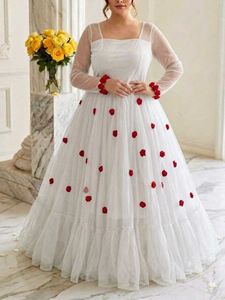 Elegant White Gown with Red Rose Embellishments