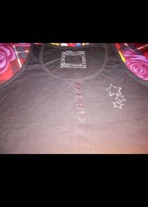 Black Tank Top with Star Embellishments