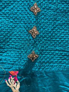 Elegant Teal Embroidered gown