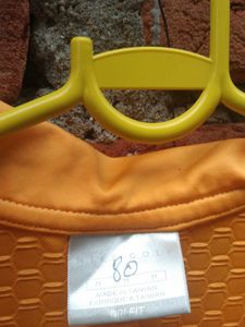 Orange Sleeveless Polo Neck Top