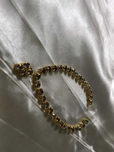 Elegant Gold Chain with Dark Stones