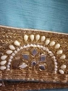 Stunning Blue Saree with Golden Embellishments