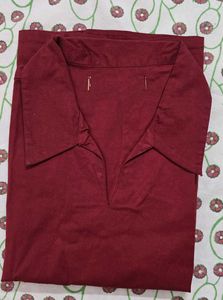 Embellished red sleeveless top
