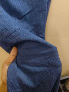 A denim dress sleeveless