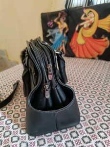 Stylish Black Handbag with Fur Pom-Pom