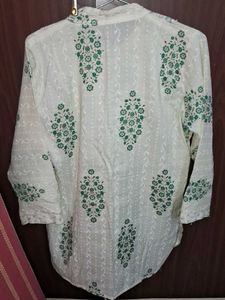 Elegant White short Kurta with Green Floral Print