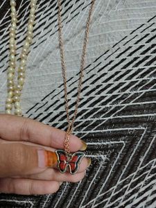 Elegant Pearl Necklace and Butterfly Pendant