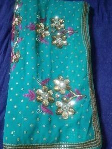 Embellished Teal lehenga Saree with Floral Motifs