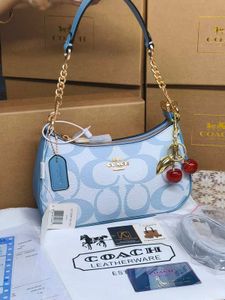 Coach Teri sky blue with cherry 🍒 charm