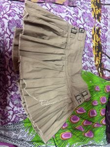 Tan Pleated Mini Skirt with Buckles