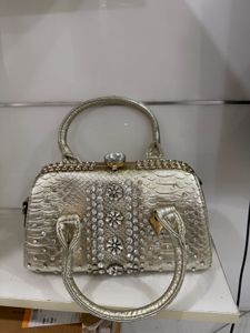 Elegant Gold Embossed Handbag