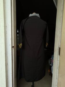 Elegant Black Kimono with Unique Neckline