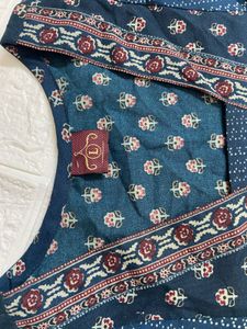 Elegant Teal Kurta Set with Intricate Print