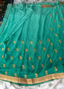Stunning Teal Saree with Gold Embroidery