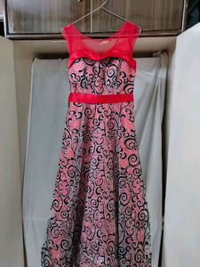 Glittery Red Gown With Black Detailing