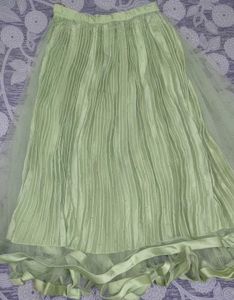 green lehenga with embellishments
