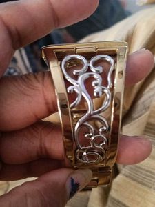 Elite women.s gold &amp; silver bangle watch