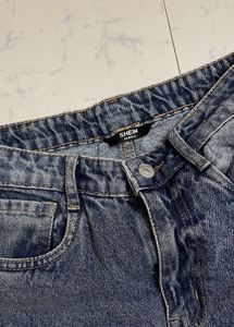 Distressed Blue Denim Jeans