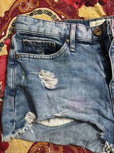 blue ripped denims short