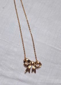 Gold Tone Bow Necklace