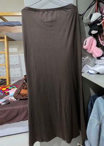 Elegant Brown Maxi Skirt with Brooch Detail