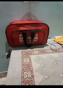Red Alankar Jewellers Travel Bag