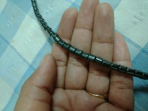 Gun metal neck piece