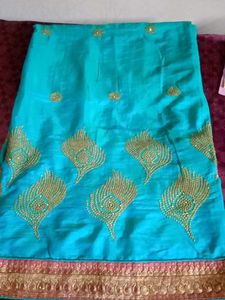 Beautiful Teal Saree with Gold Peacock Embroidery