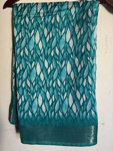 Elegant Teal Saree with Intricate Border
