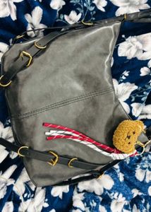 adjustable buckle shoulder bag