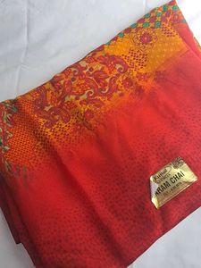new daily Vibrant Red & Yellow Printed Saree