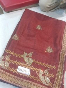 Elegant Maroon Saree with Peacock Embellishments