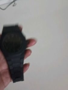Sleek Black Watch with Unique Dial
