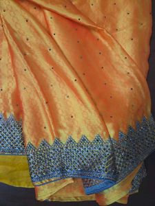 Exquisite Yellowish Embellished Saree