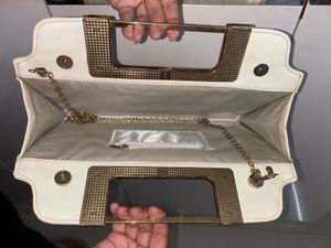 Elegant White Clutch with Gold Handle