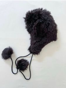 Cozy Faux Fur Trapper Hat with Pom Poms