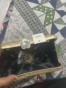 Sparkling Gold Clutch with Rhinestone Embellishmen