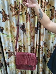 Stylish Baggit Brand maroon colour Crossbody Bag