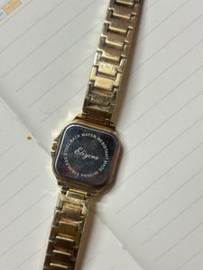 Elegant Gold Watch with Crystals