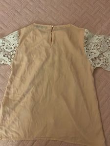 Lacy feminine peach top