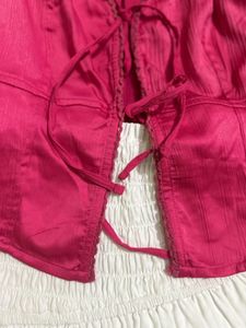 Chic Pink Lace-Up Crop Top with white skirt