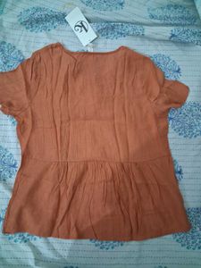 beautiful orange top