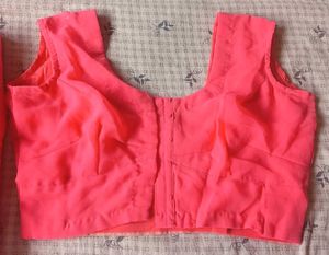 Vibrant Pink Saree with Sleeveless Blouse